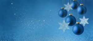 Festtagsbild mit Weihnachtskugeln als Sinnbild für den letzten Alpha1 Newsletter im Jahr 2025